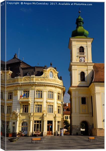 Bell tower of RC Church in Sibiu Canvas Print by Angus McComiskey