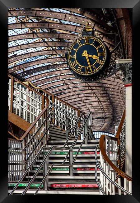 The clock at York railway station, England Framed Print by John Hall