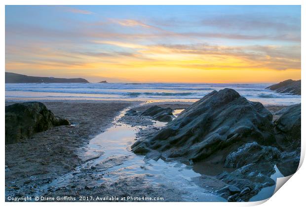 Fistral Beach Sunset by the rocks Print by Diane Griffiths