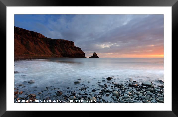 Sun lighting up Talisker Point at Sunset Framed Mounted Print by Maria Gaellman