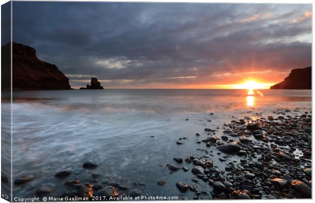 Talisker Bay and Spikes from the setting Sun Canvas Print by Maria Gaellman