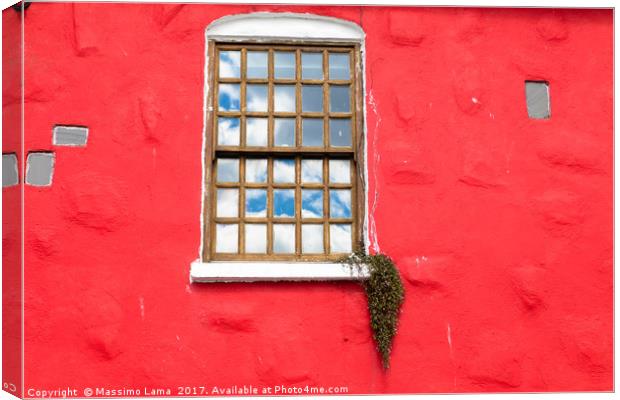 Window on red wall Canvas Print by Massimo Lama