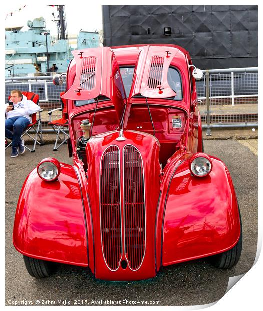 Red Car with Owner Print by Zahra Majid