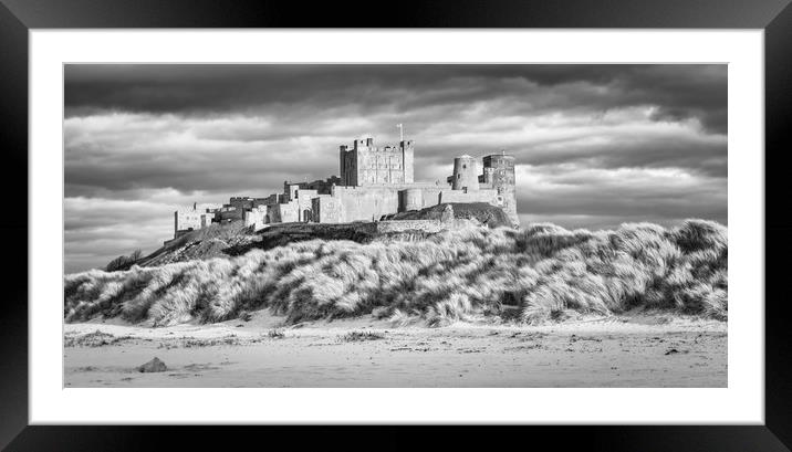 Imposing Bamburgh Castle in Mono Framed Mounted Print by Naylor's Photography