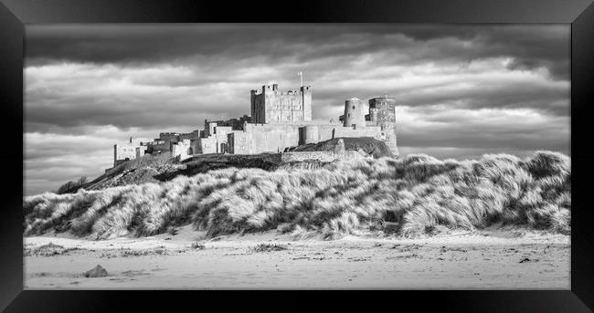 Imposing Bamburgh Castle in Mono Framed Print by Naylor's Photography