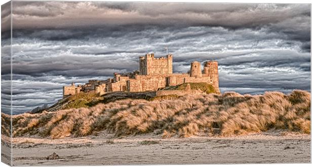 Bamburgh Castle Power Canvas Print by Naylor's Photography