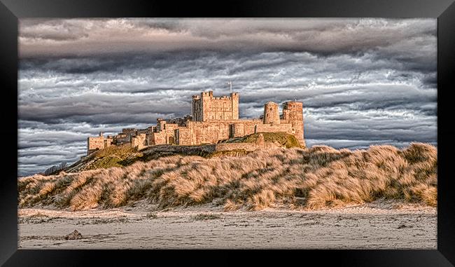 Bamburgh Castle Power Framed Print by Naylor's Photography