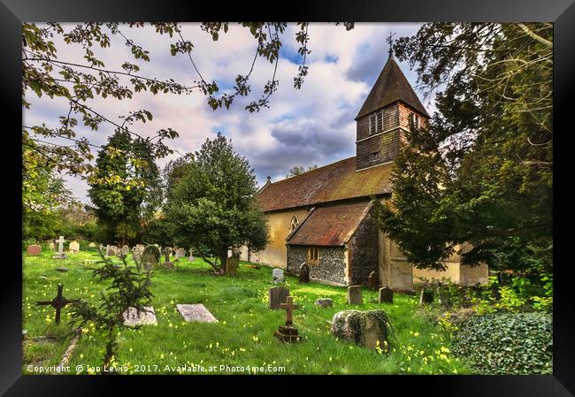 The Churchyard at St Laurence Tidmarsh Framed Print by Ian Lewis