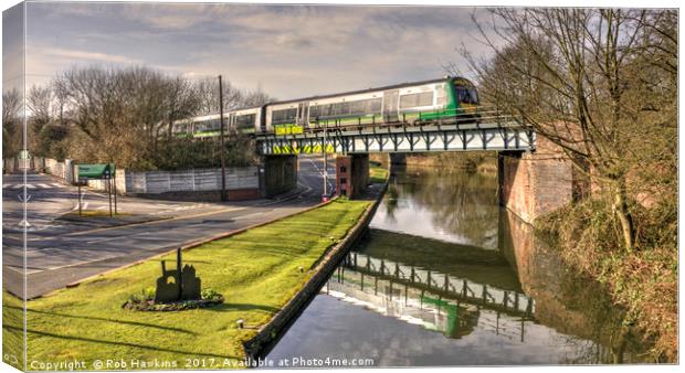 Train v Canal  Canvas Print by Rob Hawkins
