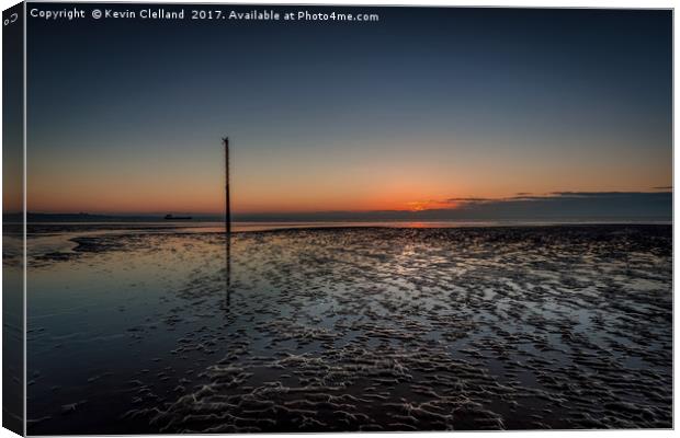 Crosby Beach as the sun sets Canvas Print by Kevin Clelland