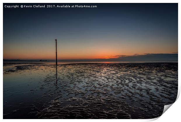 Crosby Beach as the sun sets Print by Kevin Clelland