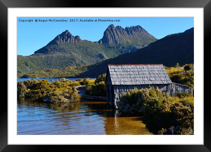 Boat shed with backdrop of Cradle Mountain Framed Mounted Print by Angus McComiskey