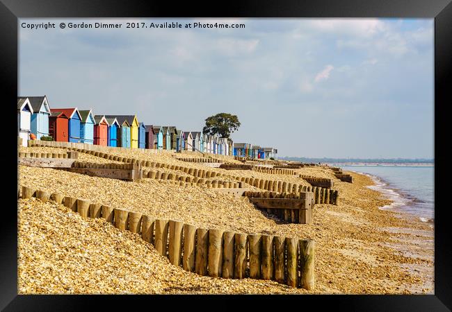 Colourful Beach Huts at Calshot Framed Print by Gordon Dimmer