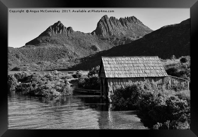 Boat shed with backdrop of Cradle Mountain (mono) Framed Print by Angus McComiskey