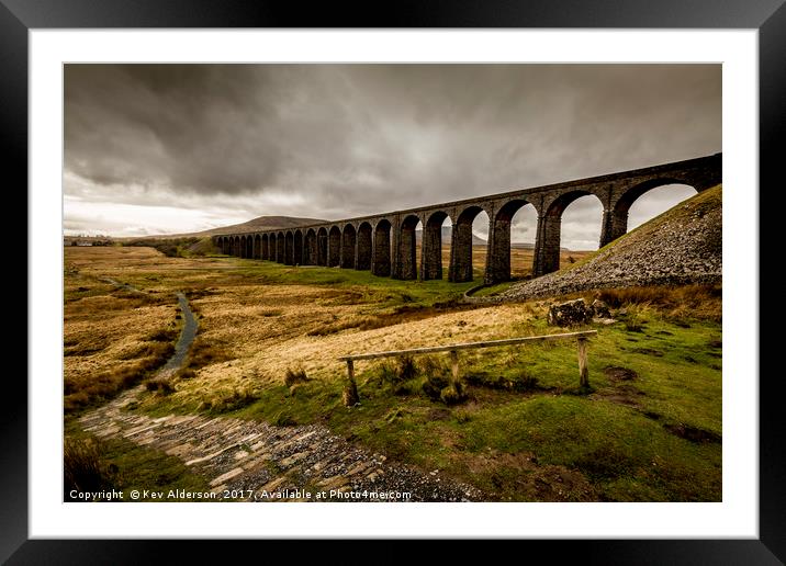 Moody Giant Framed Mounted Print by Kev Alderson