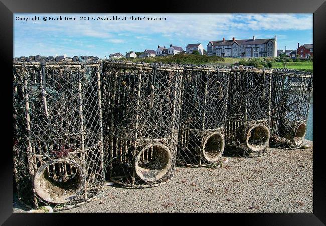 Lobster pots at Caemis Bay, Anglesey Framed Print by Frank Irwin