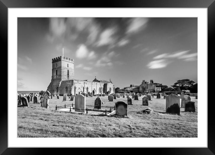 Pretty church of St Aidans in Bamburgh in Mono Framed Mounted Print by Naylor's Photography