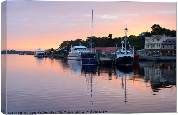 Strahan seafront at sunset Canvas Print by Angus McComiskey