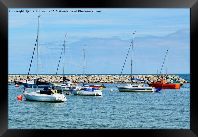 The tranquil harbour of Rhos-on-Sea Framed Print by Frank Irwin