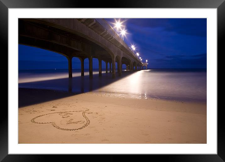 Love heart in the sand at Boscombe Pier Framed Mounted Print by Ian Middleton