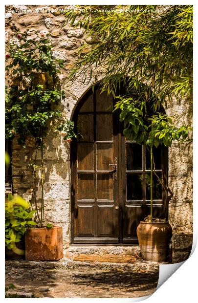 A Shadowy Door in Saint Paul de Vence, France. Print by Maggie McCall