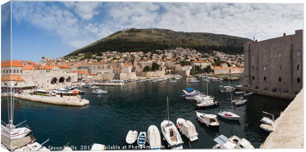 Dubrovnik harbour at the foot of Mount Srd Canvas Print by Jason Wells