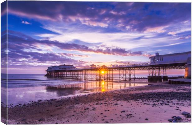 Cromer pier with sunrise starburst Canvas Print by Mark Hawkes