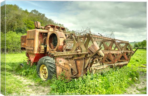 The abandoned Combine  Canvas Print by Rob Hawkins