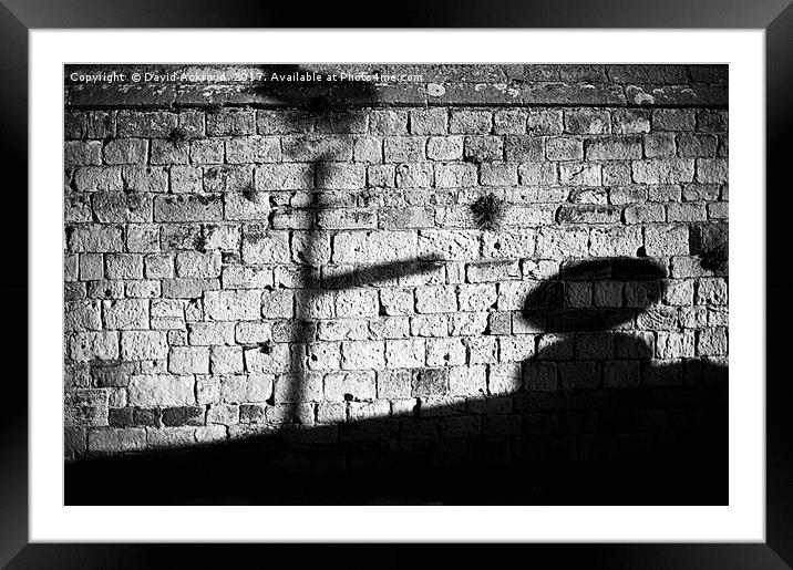 shadow on the wall Framed Mounted Print by David Ackroyd