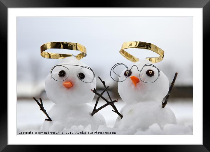Two cute snowman angles with golden halos Framed Mounted Print by Simon Bratt LRPS