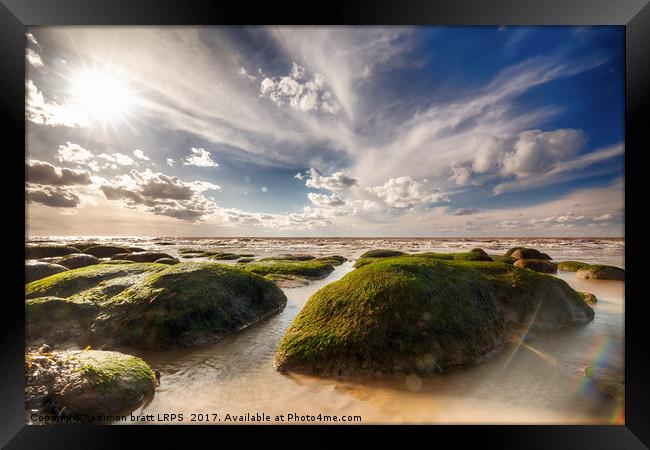 Hunstanton coastline with  seaweed rock outcrops o Framed Print by Simon Bratt LRPS