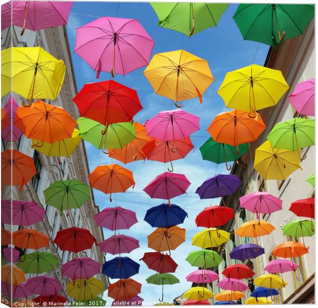 Roof of umbrellas Canvas Print by Marinela Feier