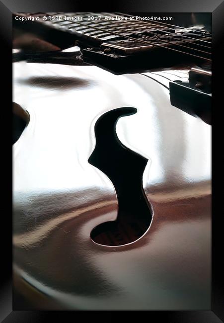 Guitar "f" hole. Framed Print by RSRD Images 