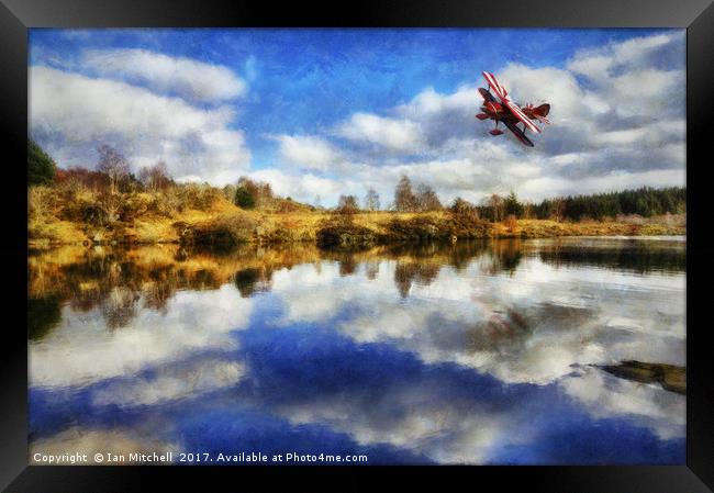 Flight Over The Lake Framed Print by Ian Mitchell