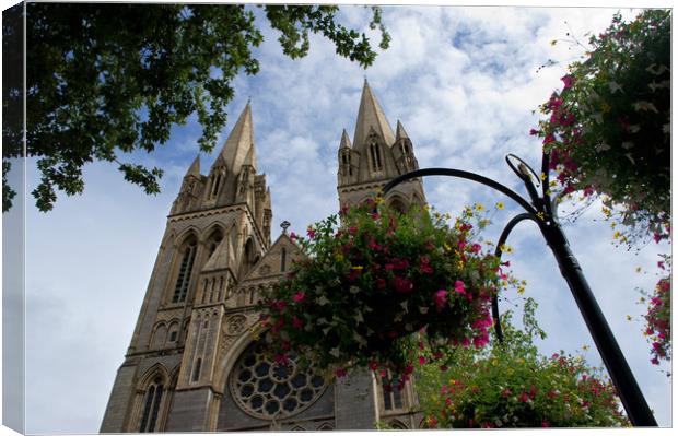 Flowers and cathedral, Truro Canvas Print by Linda Cooke