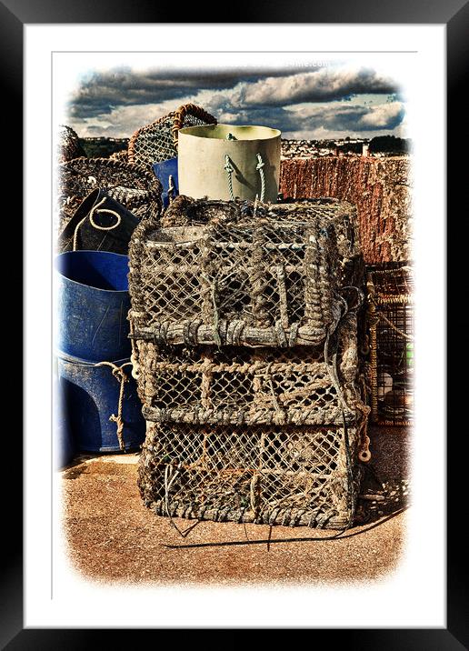 Lobster pots stacked up ready for reuse. (grunged) Framed Mounted Print by Frank Irwin