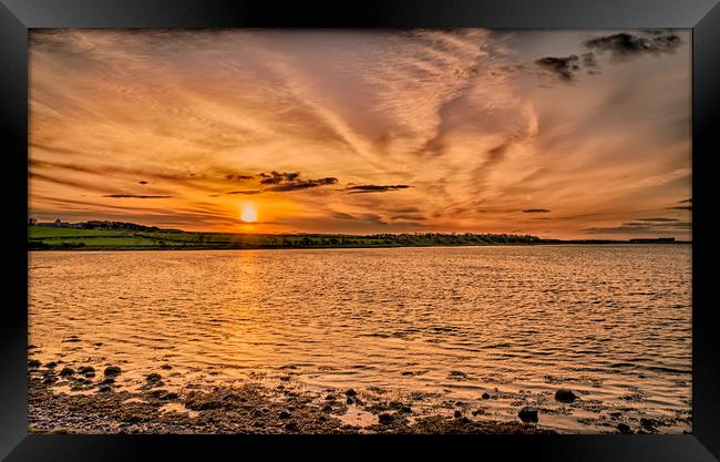Sunset at Budle Bay high tide Framed Print by Naylor's Photography