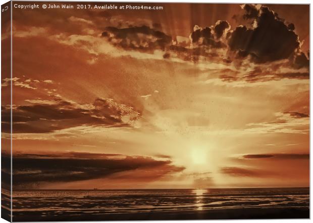 Sunset rays Canvas Print by John Wain