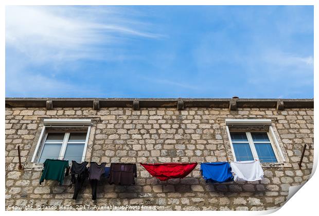 Looking up at laundry on the line Print by Jason Wells