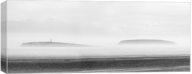 Islands in the mist Canvas Print by Andrew Richards