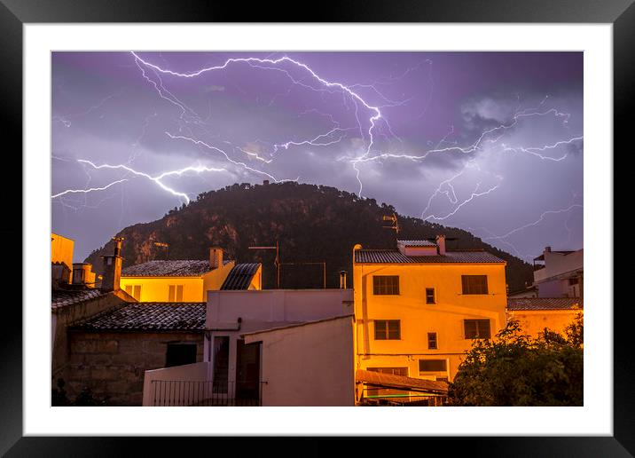 Lightning over the Puig Framed Mounted Print by Perry Johnson