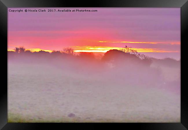 Sunrise Through The Mist Framed Print by Nicola Clark