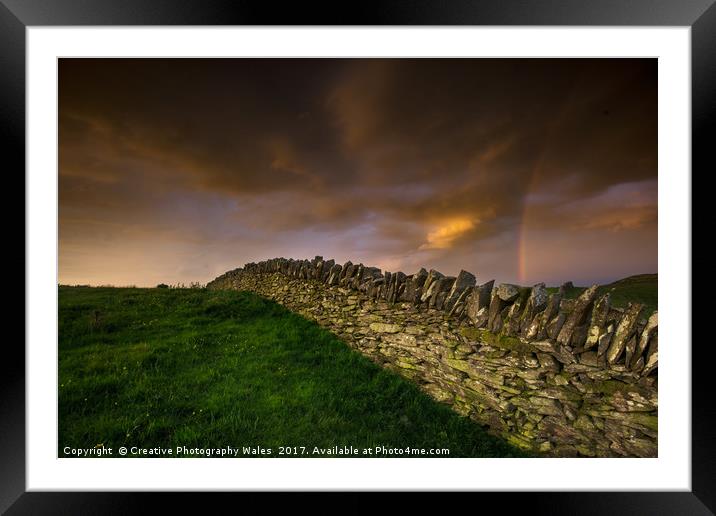 A stone wall and rainbow Framed Mounted Print by Creative Photography Wales