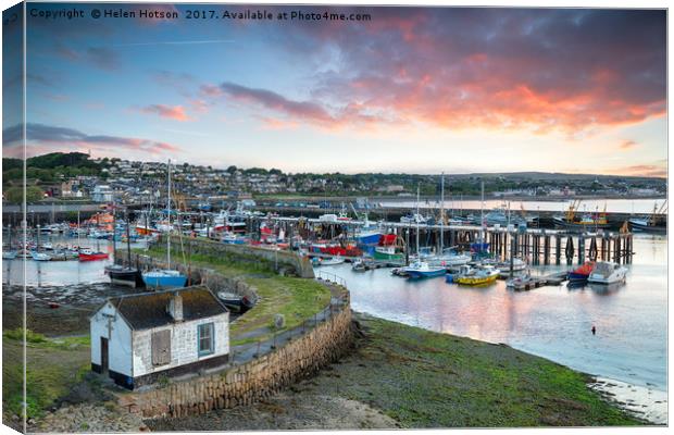 Sunrise at Newlyn in Cornwall Canvas Print by Helen Hotson