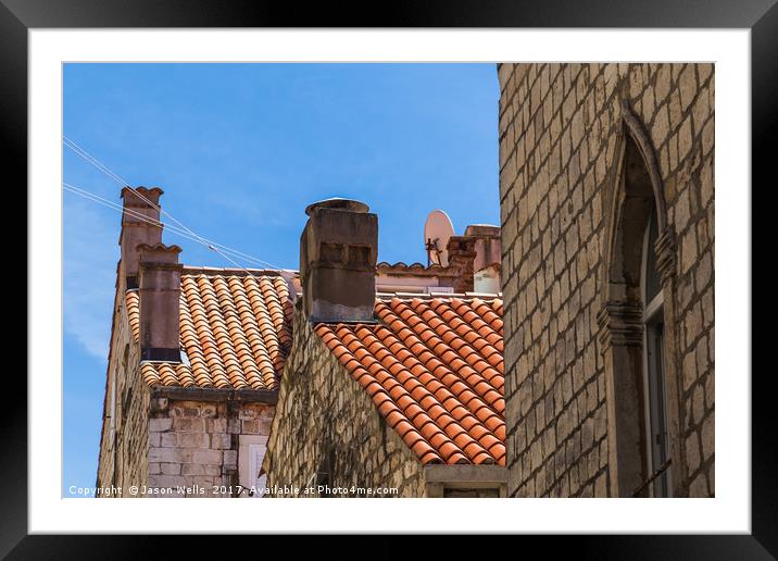 Looking up at Dubrovnik's colourful buildings Framed Mounted Print by Jason Wells