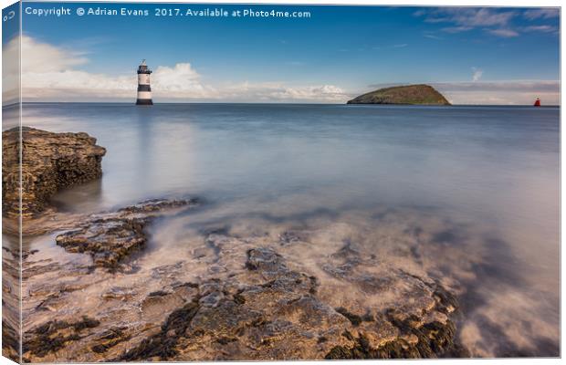 Puffin Island Lighthouse Anglesey Canvas Print by Adrian Evans