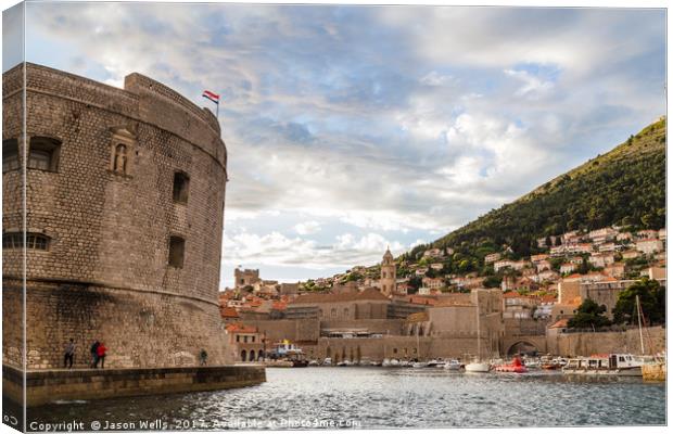 Dubrovnik's old harbour Canvas Print by Jason Wells