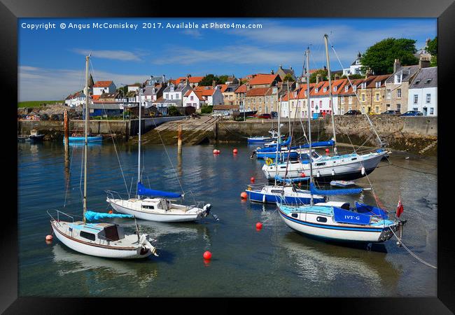 Yachts at anchor in St Monans harbour Framed Print by Angus McComiskey