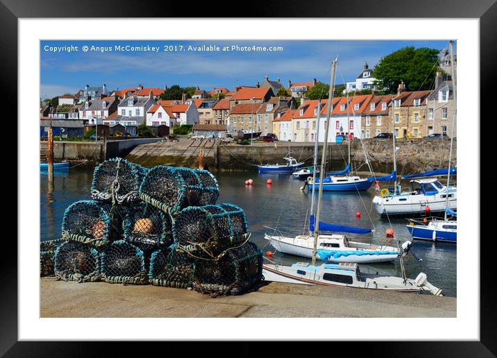 Lobster pots on quayside at St Monans Framed Mounted Print by Angus McComiskey
