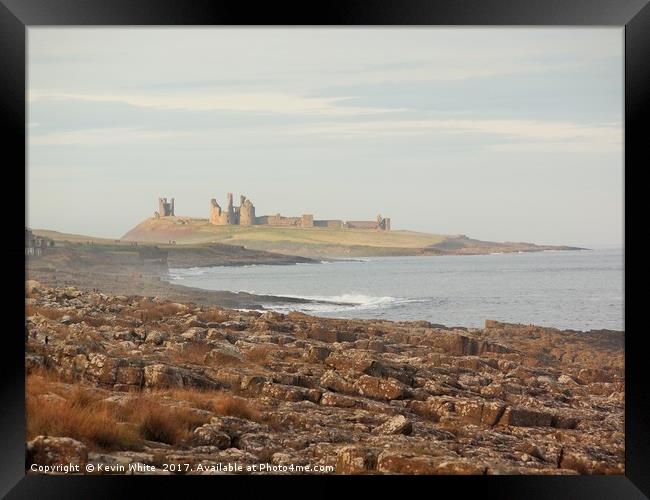 Dunstanburgh Castle Framed Print by Kevin White